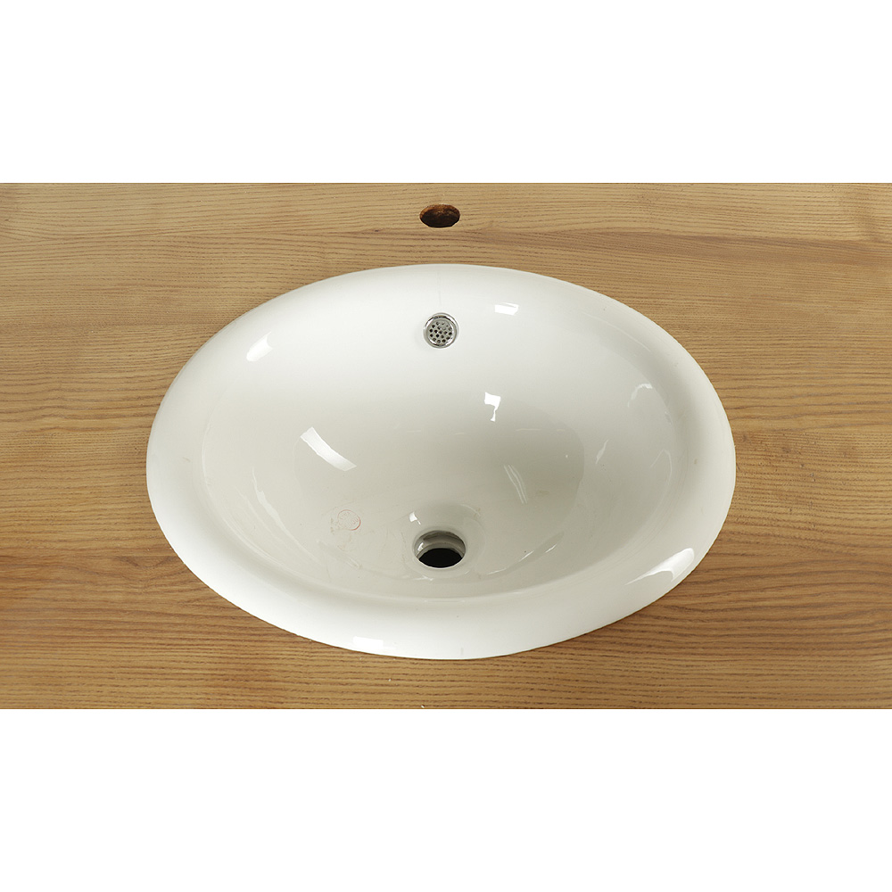 Zelená koupelnová skříňka s jasanovou deskou a umyvadlem